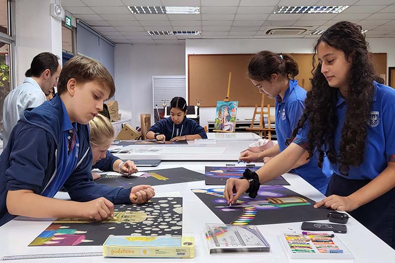 Secondary students attending visual arts class