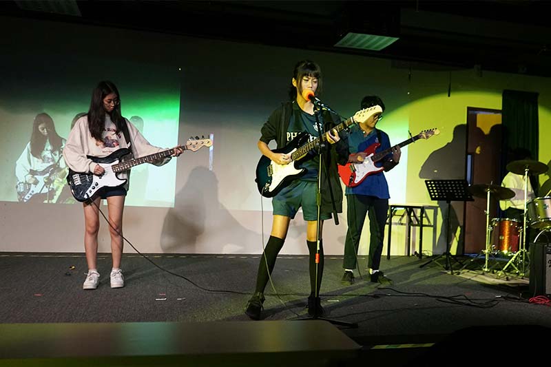 High school students performing music at the Arts Night