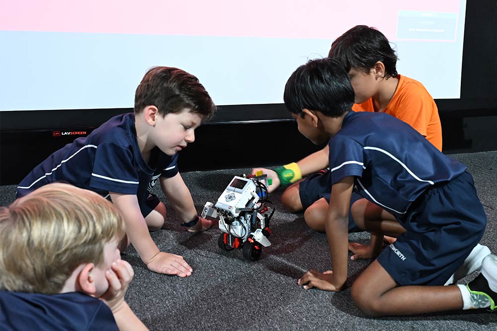 Primary students share their robotic explorations at the PYP Exhibition