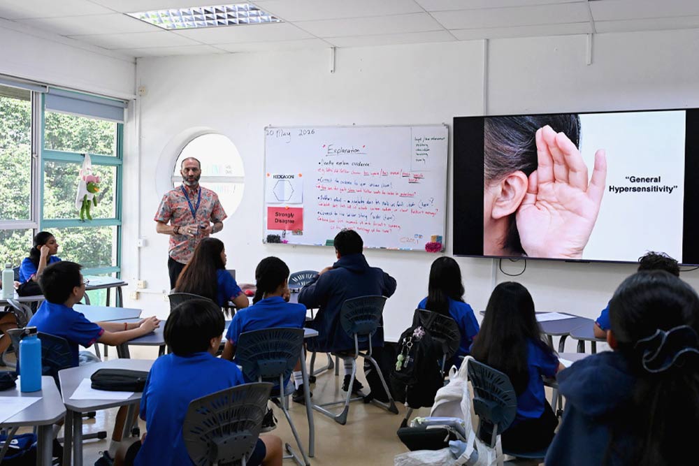 A teacher shares his personal story at the Human Library