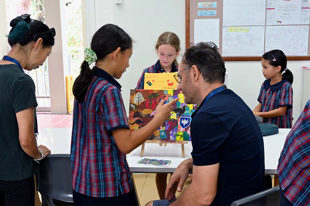 Primary students showcase their work to their parents