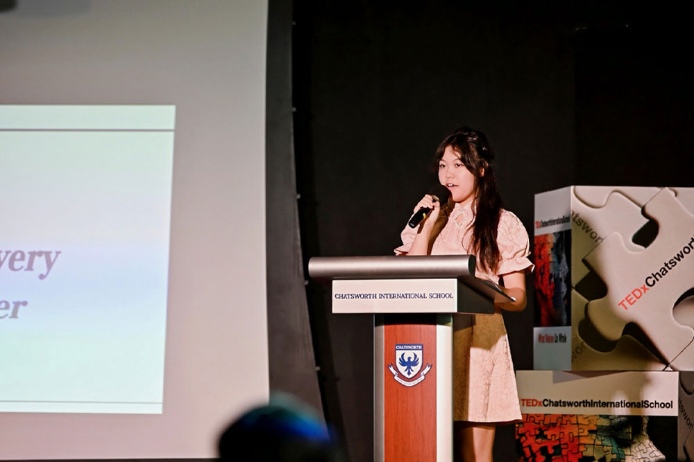 A student shares her personal story at the TEDxChatsworth conference