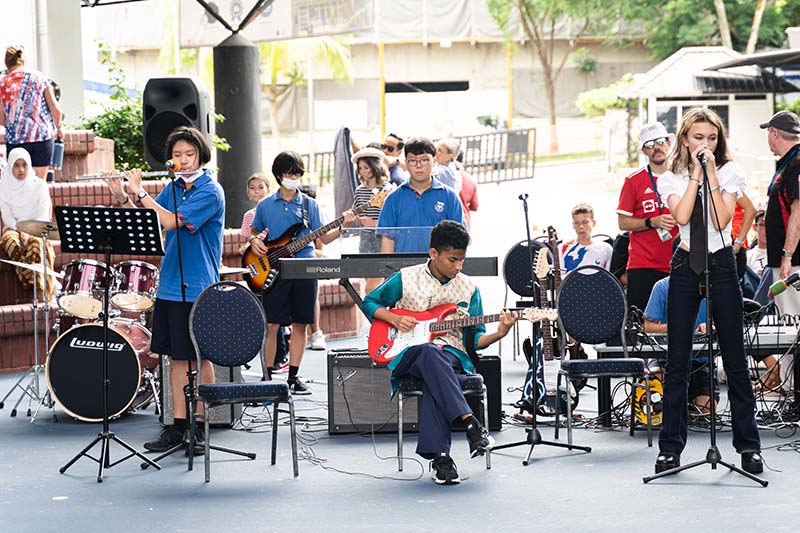Music band students performing at a school event
